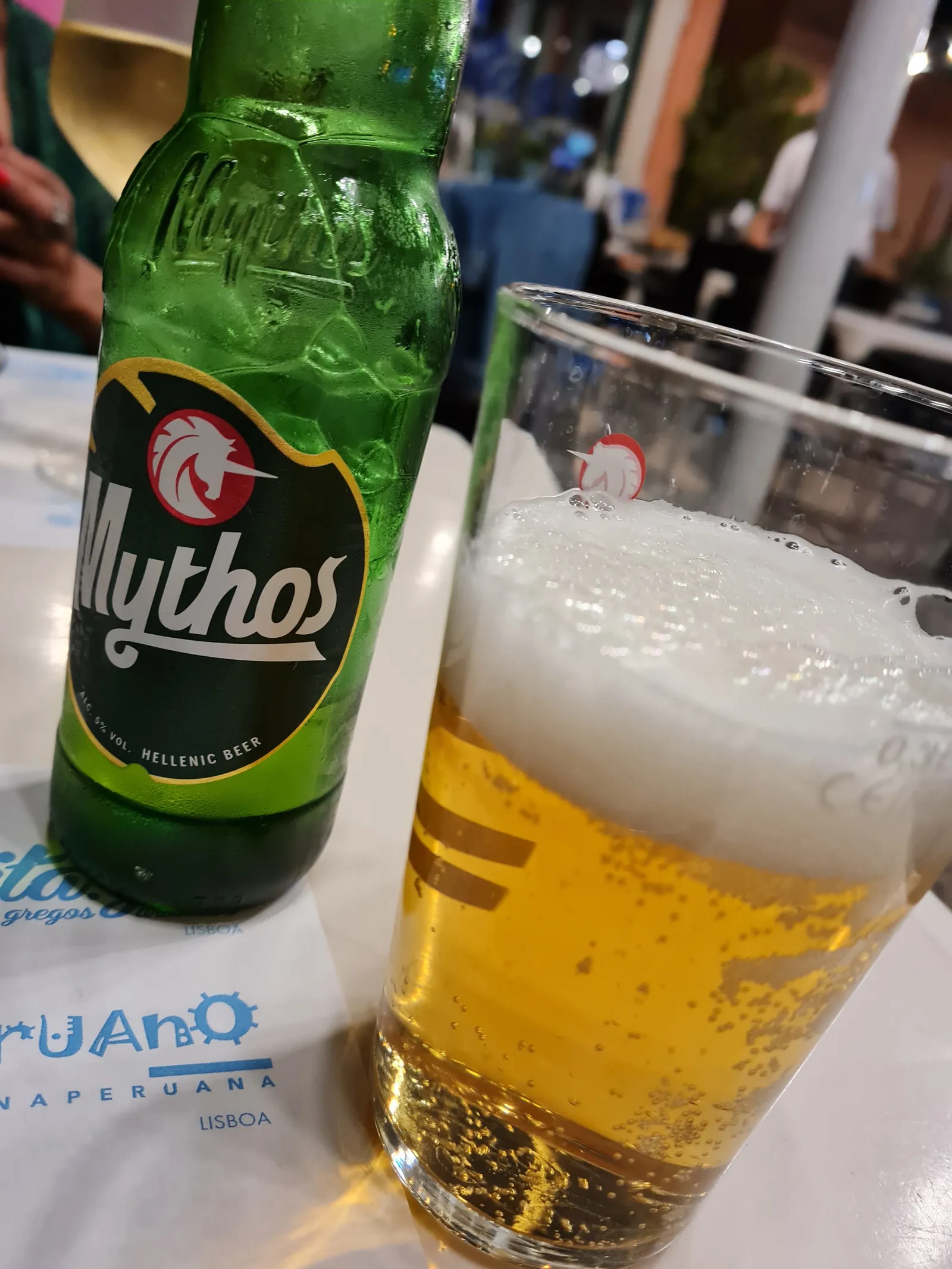 Mythos, tastada a Lisboa
